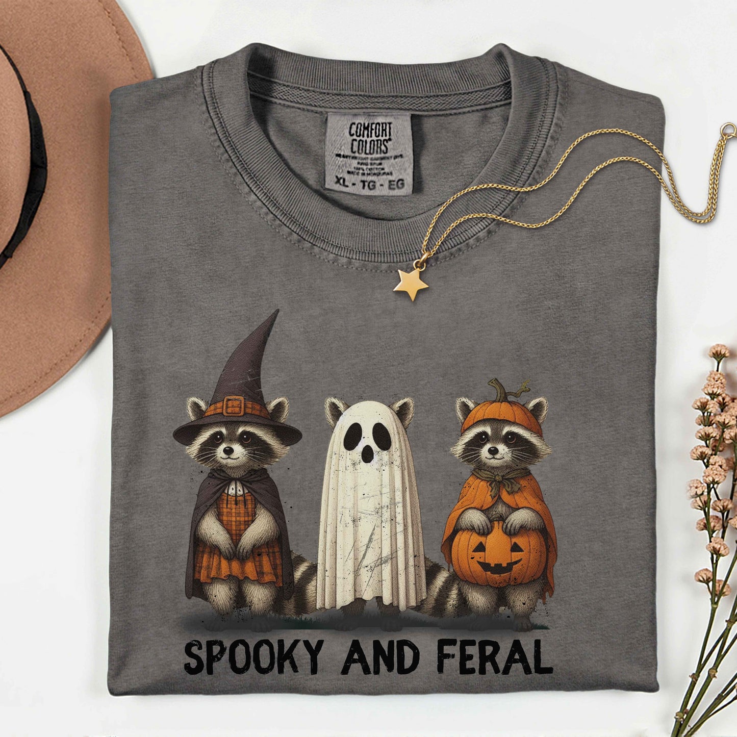 Whimsical Halloween Raccoons T-Shirt – Garment-Dyed Unisex Tee with Witch, Ghost & Pumpkin Design